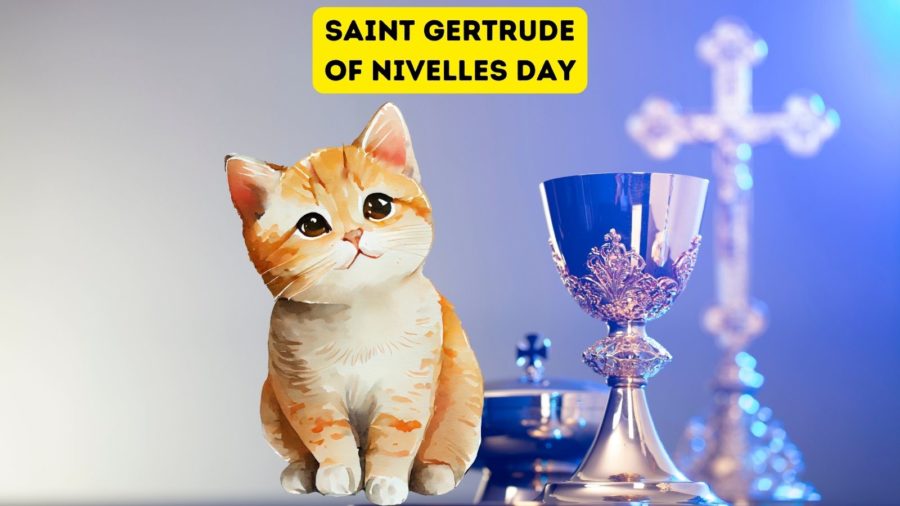watercolor image of orange tabby kitten with cross and Catholic items in background. Words "Saint Gertrude of Nivelles Day" at top of image.